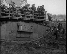 People Riding a Tank Over Rough Terrain, 1920. Creator: British Pathe Ltd