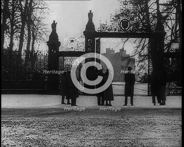 People Standing Outside the Gates of Sandringham House, 1936.  Creator: British Pathe Ltd.