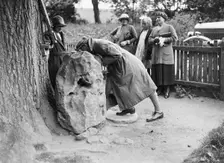 People visiting King Alfred's Blowing Stone, Kingston Lisle, near Uffington, Oxfordshire, c1920s. Artist: Bill Brunell