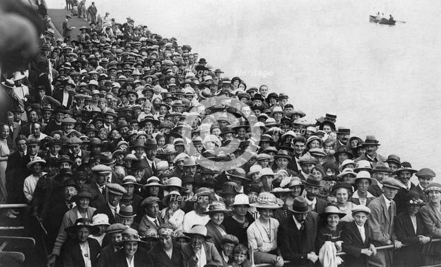 People waiting to go on a boat trip, Bournemouth Pier, August 1921. Artist: Unknown