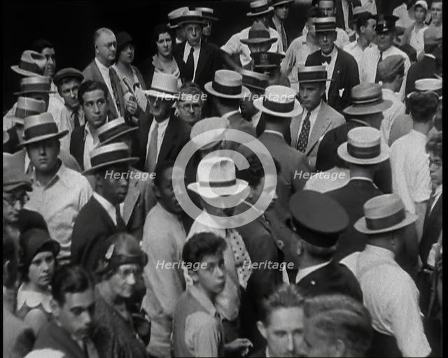 People Walking Around on a Crowded Street, 1930s. Creator: British Pathe Ltd.