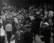 People Walking Around on a Crowded Street, 1930s. Creator: British Pathe Ltd