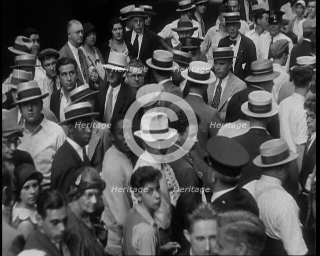 People Walking Around on a Crowded Street, 1930s. Creator: British Pathe Ltd.