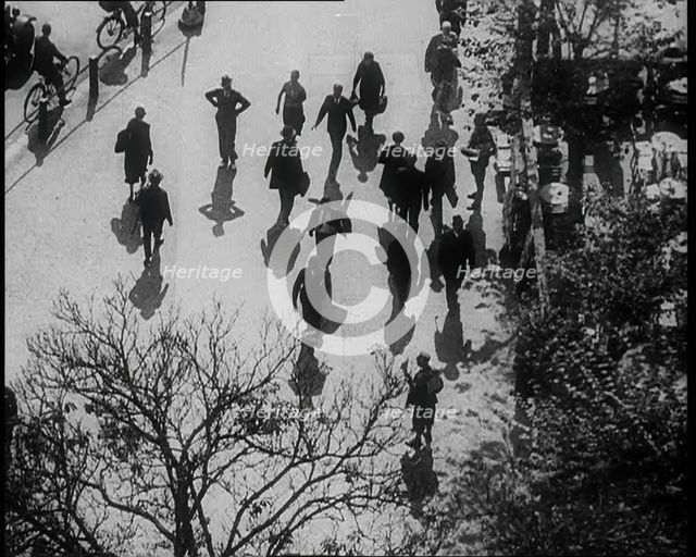 People Walking Around a Pavement, 1933. Creator: British Pathe Ltd.