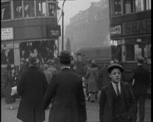 People Walking Around the Streets of London, 1930s. Creator: British Pathe Ltd
