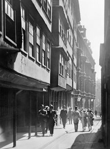 People walking down Temple Lane, Westminster, London. Creator: Unknown