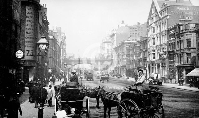 People walking down Farringdon Street looking towards Holborn Viaduct, City of London, 1890. Artist: Unknown