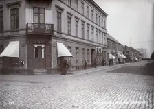 People walking on Queen's street, Landskrona, Sweden, 1900. Creator: Borg Mesch