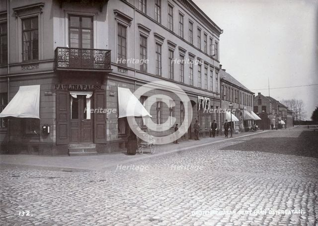 People walking on Queen's street, Landskrona, Sweden, 1900. Creator: Borg Mesch.
