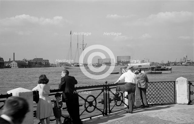 People watching traffic on the Thames, Greenwich, London, c1945-c1965. Artist: SW Rawlings