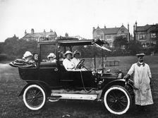 People with a 1914 Model T Ford , 1914