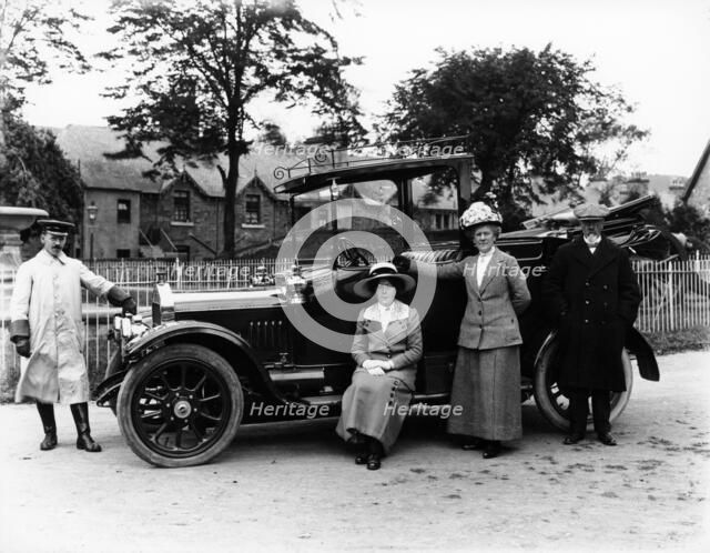 People with a 1914 Singer. Artist: Unknown