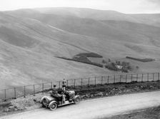 People with a Morris Cowley at the Devil's Beef Tub, Scotland, (c1930s?)