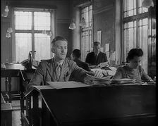 People Working in an Office, 1940. Creator: British Pathe Ltd