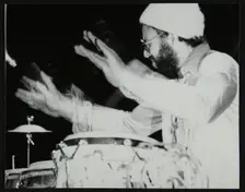 Percussionist Guilherme Franco playing at the Newport Jazz Festival, Middlesbrough, 1978. Creator: Denis Williams