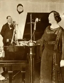 Performers singing a duet in one of the studios of 2LO, Savoy Hill, London, 1923, (1935). Creator: Unknown