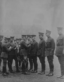 Pershing decorating Americans, Feb 1919. Creator: Bain News Service