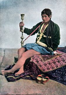 Persian woman smoking in Kalgan, c1890