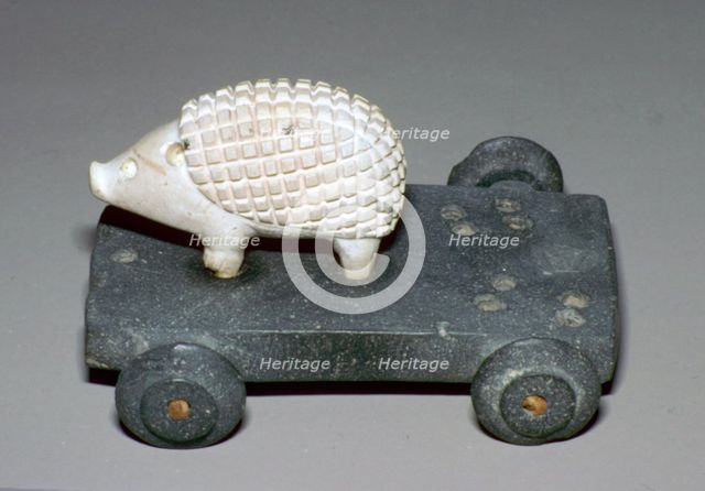 Persian hedgehog mounted on a wheeled carriage. Artist: Unknown