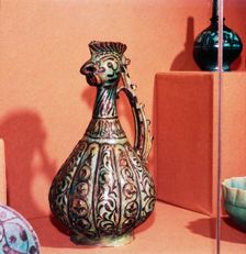 Persian (Kashan) Ewer with cockerel's head and tail handle, early 13th century