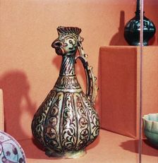 Persian (Kashan) Ewer with cockerel's head and tail handle, early 13th century