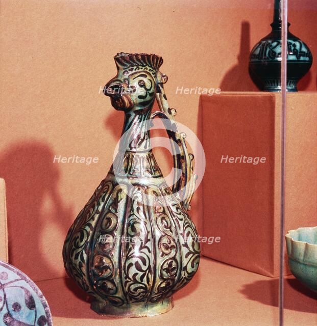 Persian (Kashan) Ewer with cockerel's head and tail handle,  early 13th century Artist: Unknown.