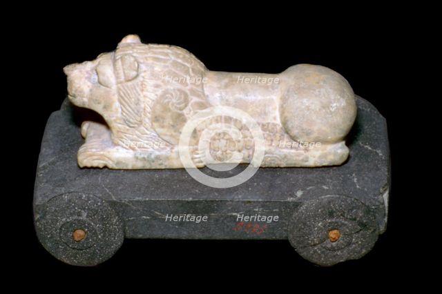 Persian lion mounted on a wheeled carriage. Artist: Unknown