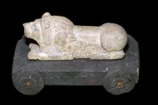Persian lion mounted on a wheeled carriage