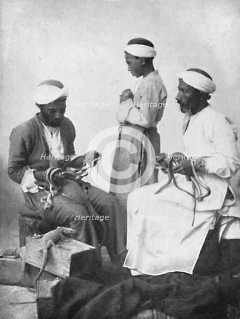 Persian snake charmers, 1902. Artist: W Rau.