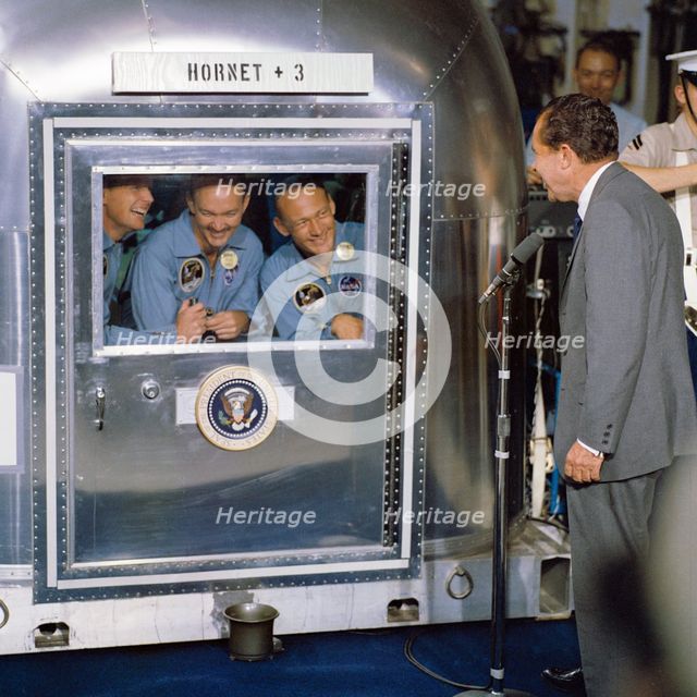 Pesident Nixon visits Apollo 11 crew in quarantine. Creator: NASA.
