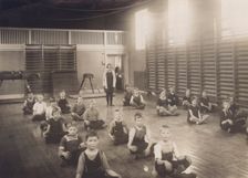 Physical education class at school, Sweden, 1927. Creator: Otto Ohm