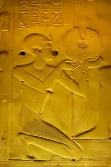 Pharaoh making an offering of a gold necklace, Temple of Seti I, Abydos, Egypt, New Kingdom (2003). Creator: LTL