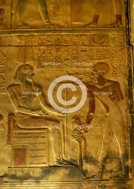 Pharaoh making offering of incense before a god, Temple of Seti I, Abydos, Egypt, New Kingdom (2003) Creator: LTL.