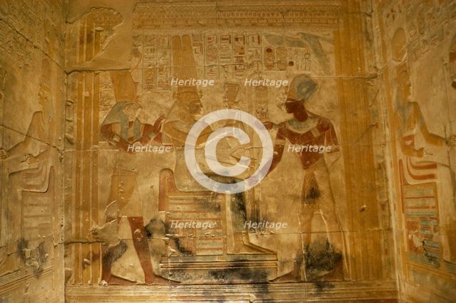 Pharaoh Seti I before the goddess Isis..., Temple of Seti I, Abydos, Egypt, New Kingdom (2003). Creator: LTL.