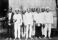 Philippines - Moro Datu And His Followers, 1913. Creator: Harris & Ewing