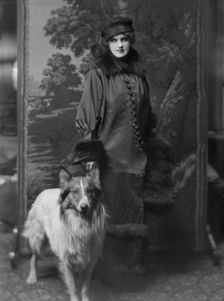 Phillips, Norma, Miss, with dog, portrait photograph, 1914 Nov. 28. Creator: Arnold Genthe