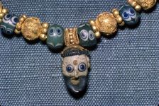 Phoenician glass head on Etruscan Necklace, c7th century BC