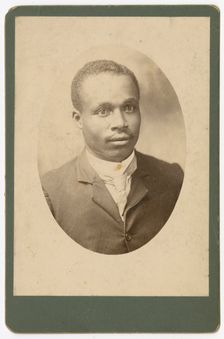 Photograph of a man wearing a suit and necktie, 1890s. Creator: Unknown
