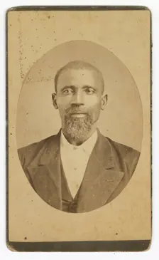 Photograph of a man with a beard wearing a dark colored suit and vest, late 19th cent - early 20th c Creator: Unknown
