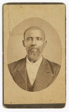 Photograph of a man with a beard wearing a dark colored suit and vest, late 19th cent - early 20th c Creator: Unknown