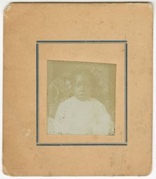 Photograph of a baby sitting in a chair, ca. 1870. Creator: Unknown