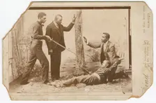 Photograph of a staged sword duel, late 19th century. Creator: Unknown