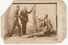 Photograph of a staged sword duel, late 19th century. Creator: Unknown