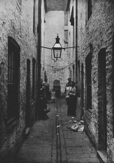 Photograph of a sunless Court in Liverpool recently closed by the Health Committee of the City Coun