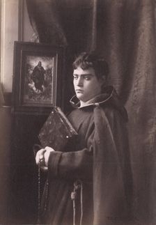 Photograph of a young man, wearing monastic robes, Taormina, Sicily, c1890s. Creator: Count Wilhelm von Gloeden