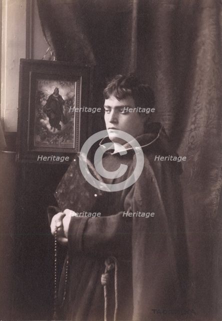 Photograph of a young man, wearing monastic robes, Taormina, Sicily, c1890s. Creator: Count Wilhelm von Gloeden.