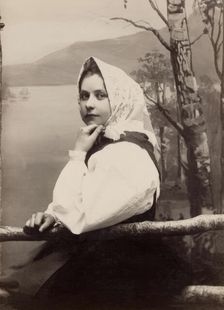 Photograph of a young girl in a white blouse and white headscarf, 1880-1890. Creator: Helene Edlund