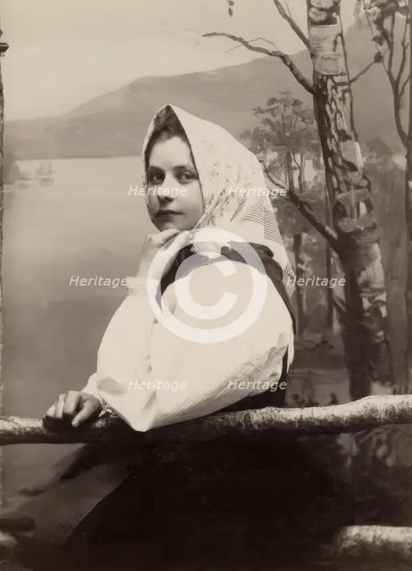 Photograph of a young girl in a white blouse and white headscarf, 1880-1890. Creator: Helene Edlund.