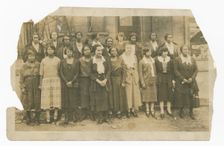Photograph of Lucille Brown among Poro agents and one small child, 1915-1953. Creator: Unknown