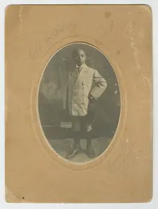 Photograph of Lucius Harper, Jr. "off to school", ca. 1910. Creator: Lucius Harper